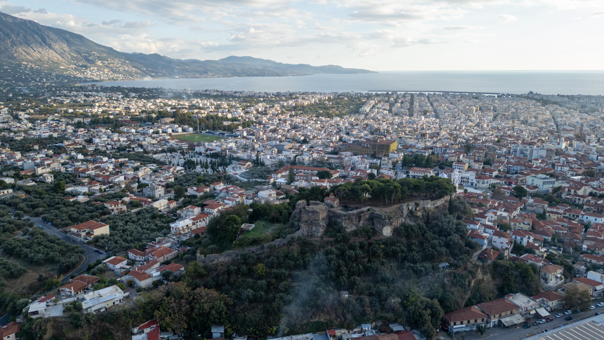 Aerial view of Kalamata city, its castle and the Messinian Gulf