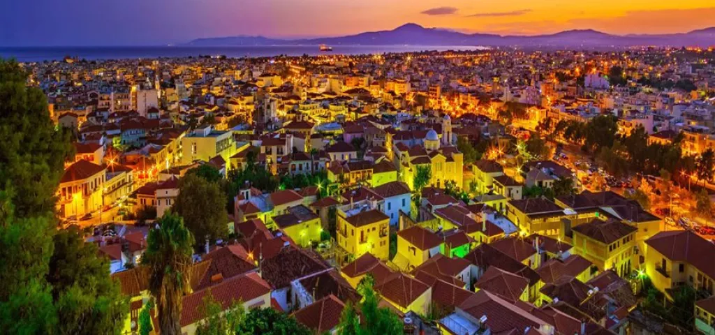 Kalamata old town rooftops glowing at sunset