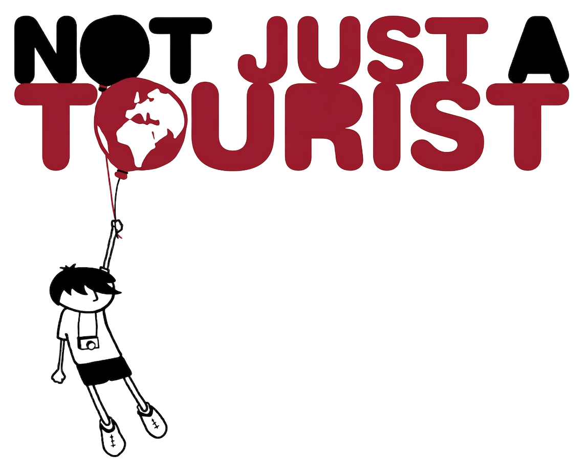 Not Just A Tourist logo